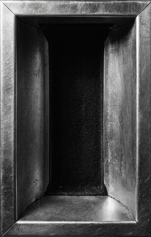 A vintage photo booth print tray
